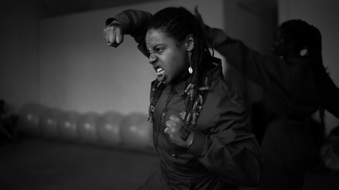 Black and White Picture of a Person in fighter pose